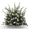 A large, white arrangement shaped in a graceful one-sided fan, Sweet Serene