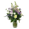 Mixed pastel bouquet in a clear glass vase