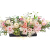 Low floral centerpiece with pink and white blooms in a black rectangular container