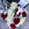 Bouquet of red and white roses with white orchids