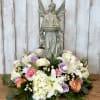This Gorgeous floral arrangement is beautiful. This includes a keepsake garden angel.