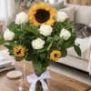 Brighten someone's day with our elegant Sunflower &amp; White Rose Bouquet, featuring