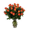 Tall arrangement of bright orange roses in a clear glass vase