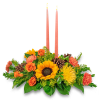 All the colors of fall are captured in this sunny centerpiece. Our