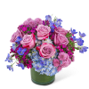 Indigo Illusion is a beautiful floral design featuring Roses, Hydrangea, Button Spray