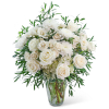 White roses and chrysanthemums in a clear glass vase