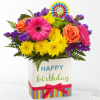 Celebrate their special day in style with our Birthday Brights arrangement, a