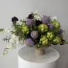 This arrangement feels like a playful little party in bloom&mdash;soft lavender scoops
