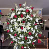 The Peaceful Memories Standing Spray offers a beautiful way to celebrate a