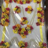 Decorative floral garland set with pink, yellow, and orange blossoms and pearl strands