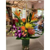 Bright, sculptural and unapologetically exotic - this tropical flower arrangement is a