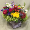 Mixed flowers in glass decor vase