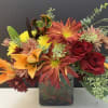 Mums, Lilies, Eucalyptus in square glass vase 
