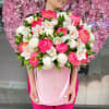 A box full of peonies
The color of the peonies might vary depending