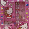 Pink Hello Kitty stationery set in a gift box with notebook and pens.