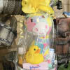 Baby gift basket with a plush toy, rubber duck, and toiletries