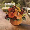 This pumpkin is sure to please! Send your special someone fall flowers