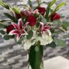  A Beautiful tower of Stargazer lilies, Red roses, hydrangea with a