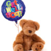 Teddy bear holding a blue "Get Well Soon" balloon
