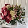 Blooming Love is a stunning floral arrangement designed to express the deepest