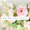 Soft pink and white flowers in a whimsical arrangement