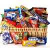 Basket filled with assorted snack-size candy and cookie packages