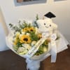 Sunflower and white rose bouquet with a graduation plush and ribbon