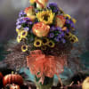 Brighten any space with this stunning fall bouquet, a creative assortment of