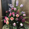 Mixed bouquet of pink, lavender, and purple flowers