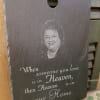Slate memorial plaque with a portrait and sympathy quote