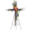 Floral cross on a metal stand with colorful flowers