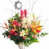 Tropical bouquet with pink orchids, roses, and orange bird-of-paradise in a white vase