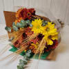 Introducing our Autumn Surprise Wrapped Bouquet, a vibrant celebration of autumn's rich
