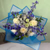 The Whispering Winds Wrapped Bouquet by Savilles Florist is a magnificent display
