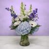 Whispering Winds Bouquet by Savilles Country Florist is a stunning display featuring