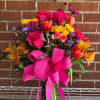 A fresh floral arrangement of vibrant colors makes this bouquet a Hot