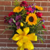 An arrangement full of bold colors for someone as confident as they