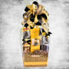 Gift basket with chocolates, a watch, and black-and-gold ribbon