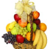 Fruit basket with apples, grapes, bananas, oranges, and a gold bow