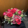 Couture Christmas is a luxury holiday floral arrangement inspired by fashion-forward design