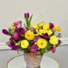 A playful mix of bold yellows and vivid pinks creates a harmonious