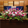 PODIUM ARRANGEMENT 124 BY TWIN TOWERS FLORIST

    As Shown