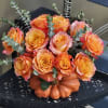 Chick roses -Free Spirit in a pumpkin vase. 