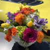 A vivid celebration in bloom, Day Dreaming is a mixed-color bouquet built
