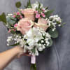 Shades of pink prom bouquet with pink roses , whit alstroemeria and