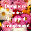 Mixed bouquet of pink, white, yellow, and red flowers