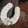 Unique design in form of a horse shoe, looks beautiful.
Disclaimer: Flowers may