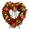 This cross displays a graceful look in these colorful reds, yellows, and