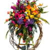 A sensational floral wreath, symbolizing the eternal circle of life. This beautiful