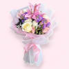 A delicate arrangement blending the purity of white roses, the sweetness of